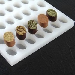 PLAQUE SILICONE CHOCOLAT - 49 ovales 32x21xht14 mm